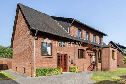 Wohnen im Grünen: Vielseitiges Haus mit Garage, Werkstatt und Traumgarten 8 zimmer