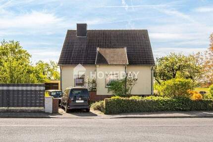 Charmantes Zweifamilienhaus mit großem Garten in attraktiver Lage 5 zimmer