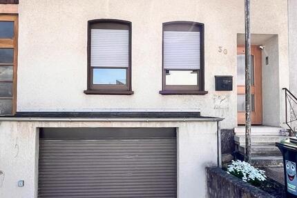 Kleines Haus mit Garage und Garten in Schwalbach