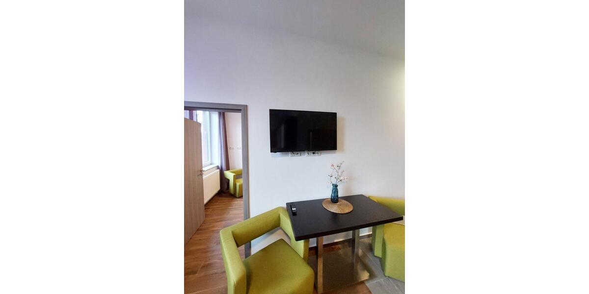 Gemütliche Wohnung mit Küche und Schlafzimmer. 1 zimmer